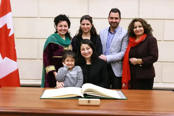 Maryam Monsef with her family at her swearing-in ceremony as the Member of Parliament for Peterborough-Kawartha