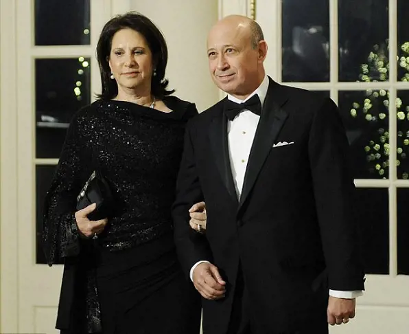Lloyd Blankfein (right) of Goldman Sachs and his wife Laura arrive for the state dinner hosted by U.S. President Barack Obama.