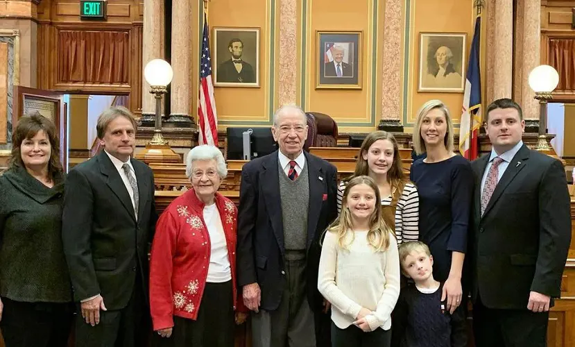 Barbara Grassley and Chuck Grassley with their family at Lowa State Capitol.