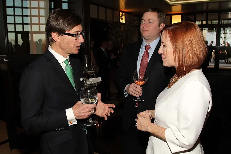 German Amb. Peter Wittig talks with Greg Mecher and Jen Psaki at The Residence of the German Ambassador on March 18, 2015 in Washington, DC.