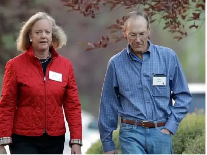 Dr. Griffith Harsh  and Meg Whitman together walking for the meeting.