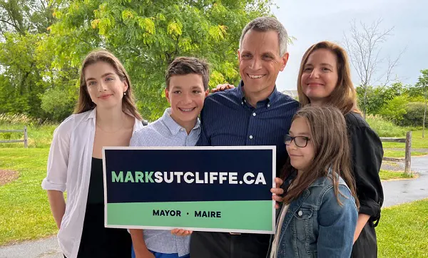 Ottawa mayoral candidate Mark Sutcliffe (third from left) is surrounded by, from left, daughter Erica, son Jack, wife Ginny and daughter Kate 