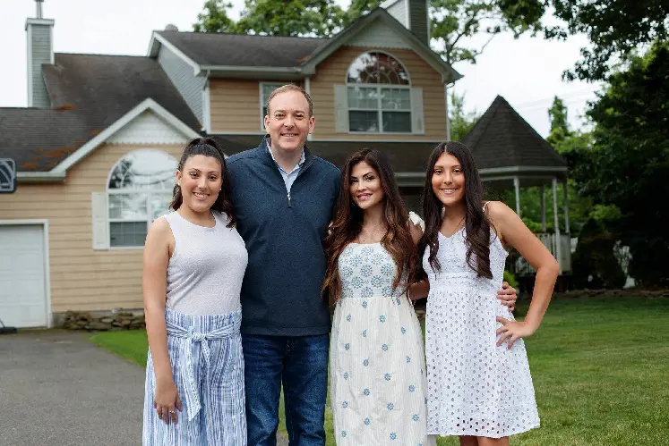 Republican candidate for governor Lee Zeldin smiles with his family at home in Shirley, New York. Tamara Beckwith
