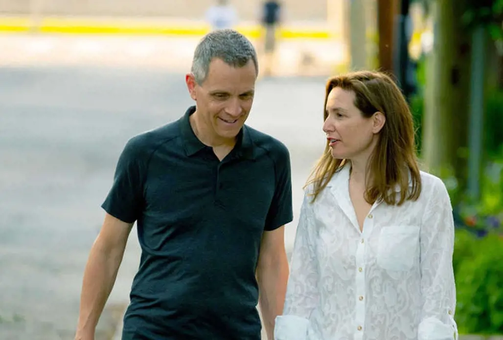 Ottawa mayoralty candidate Mark Sutcliffe walks with his wife Ginny