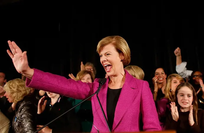 Tammy Baldwin celebrates her victory over Republican candidate Tommy Thompson as she enters the stage on election night on November 6, 2012                   
