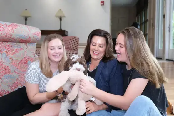 Gretchen Whitmer and her beautiful daughters, Sherry Shrewsbury(left) and Sydney Shrewsbury(right) with their pet 